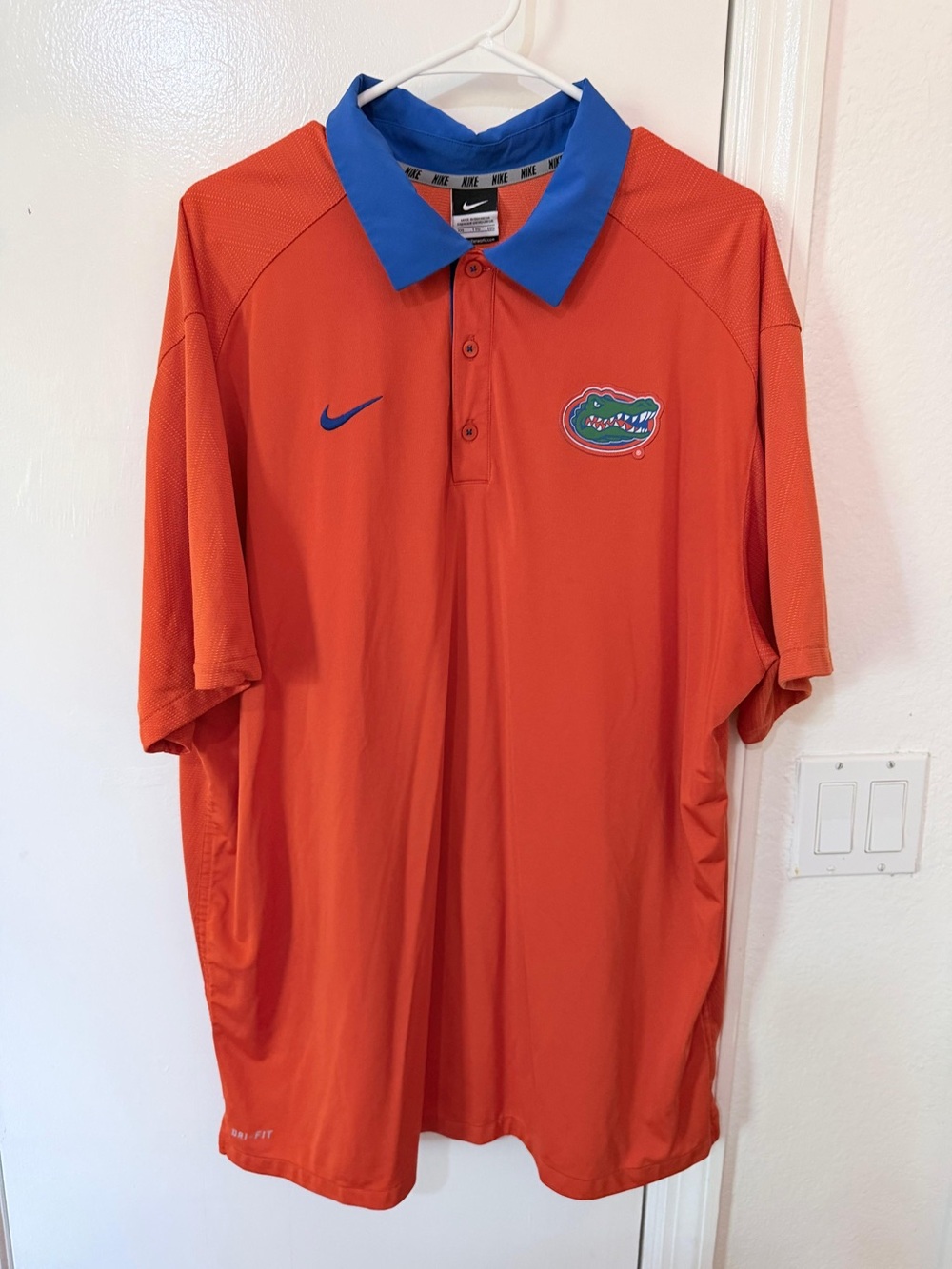 Nike Orange Polo with Blue Collar and Blue Swoosh